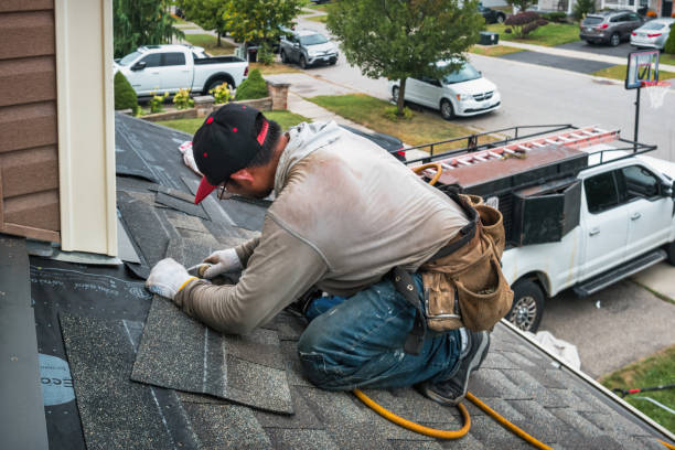Professional Roofing technician working in Brooklyn, IA